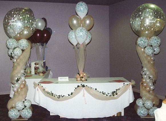 Head Table Decoration Majestic balloon columns on either side of the head
