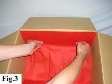 Lining the balloon box with tissue paper