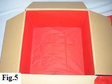 Box almost completely lined with tissue paper