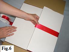 Adding deco ribbon to the outside of the box