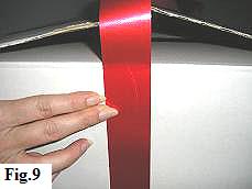 Adding the deco ribbon to the outside of the surprise balloon box