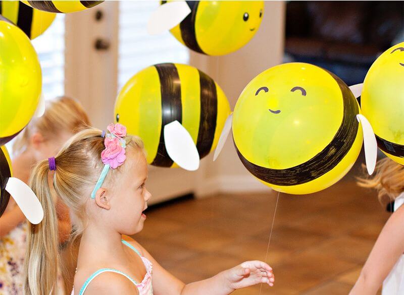 kids having fun with these bright yellow bumble bee balloons bumble bee balloons