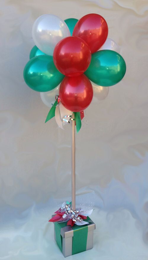 Balloon topiary tree with red, green and pearl white balloons.