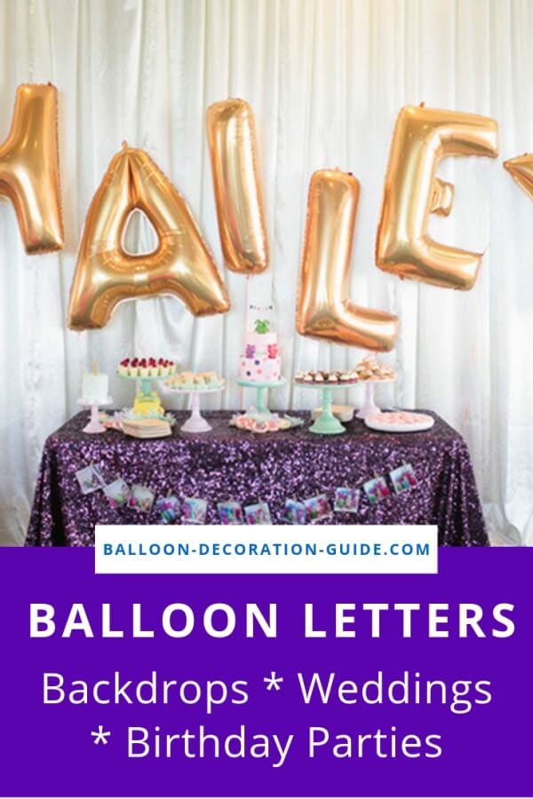 Table decoration with golden mylar balloon letters