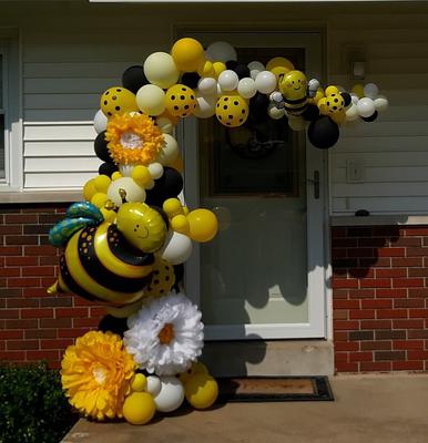 Celebrating spring with this bee themed organic balloon arch.