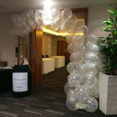 Large Champagne Bottle with Clear Balloons [Image Source: Kim StylishEvents]