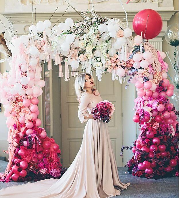 Organic balloon arch with bride