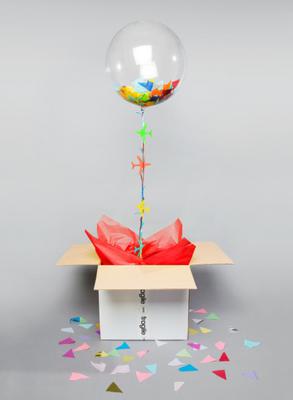 Confetti / tissue stuffed balloon in a box
