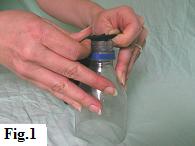 Take the balloon neck between your thumbs and index fingers while using your remaining fingers to steady the upturned funnel