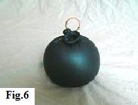 Metal or plastic ring tied into the neck of the balloon