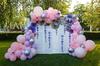 Outdoor balloon decor - beautiful but tricky to work with