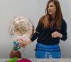 Deco Bubble with Confetti Stuck to Balloon [Source: Qualatex YouTube Channel]