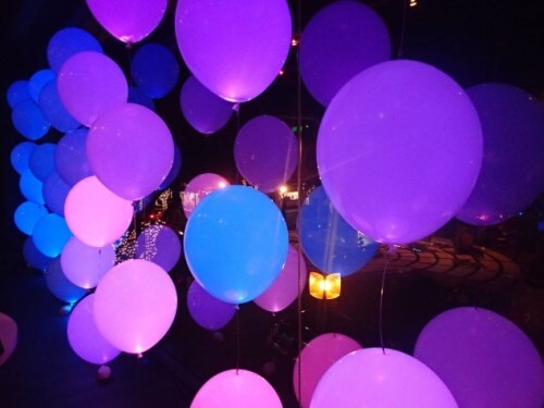 Glowing balloons floating in the air