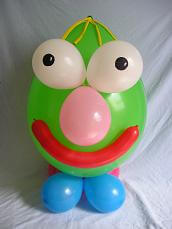 Funny balloon face, complete with a bulbous nose, big eyes, and hair.
